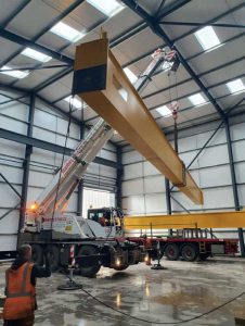 Street Crane installing Selmach’s overhead crane.