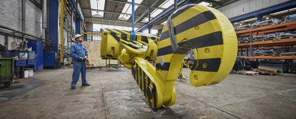 AKF refurbishes 12 giant hooks for Tata Steel