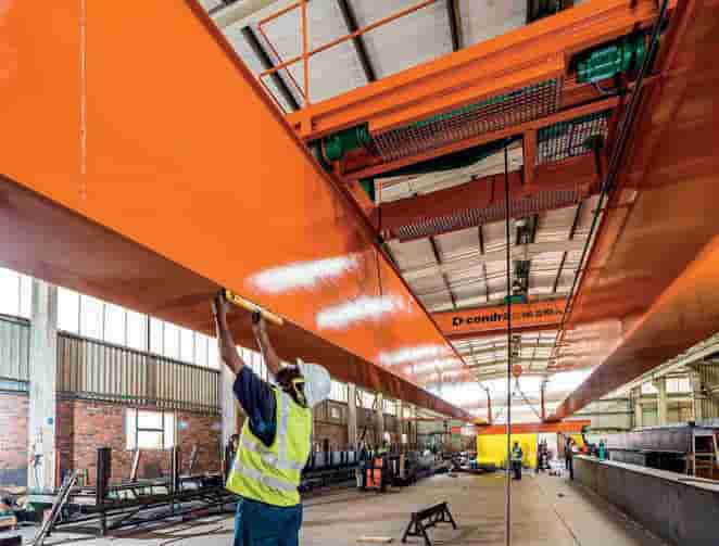 Final assembly and testing of the 35m-span Condra double-girder electric overhead travelling crane for the pl (1)