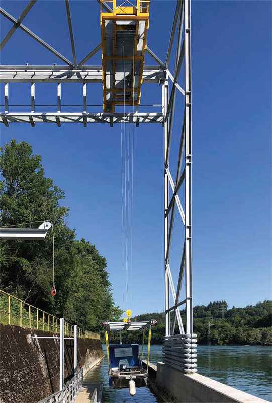 A system for lifting boats past a hydropower dam on the Upper Rhine has ...