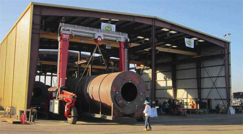 A Shuttlelift SB30 lifting tank sections in California, USA. This crane is used both inside and outside of the building